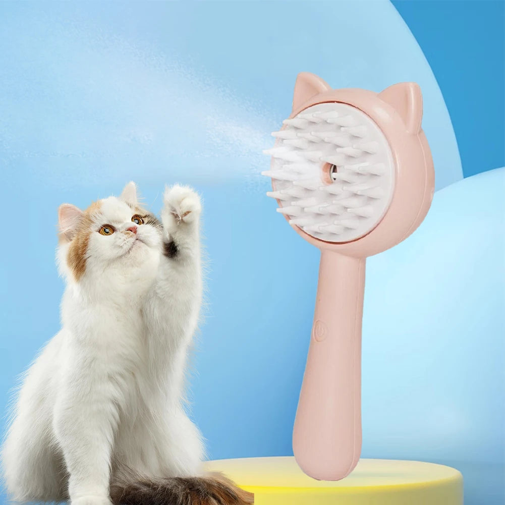Pink self-cleaning pet mist grooming brush with cat-shaped head and raised bristles