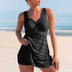 Black one-piece swimsuit with ruched chest pad and lace-patterned skirt overlay