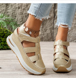 Beige wedge platform sandals with cutout uppers and hook-and-loop straps