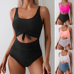 Black one-piece swimsuit with tie-front waist and contrast cutout belly panel