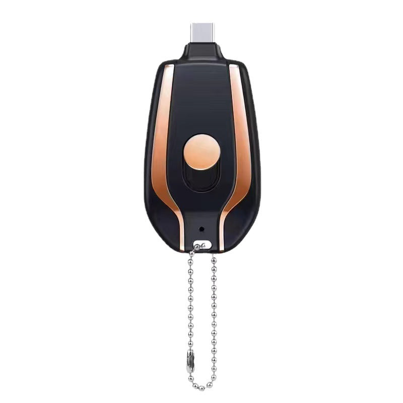 Black and orange keychain power pod charger with bead chain, round front button and LED