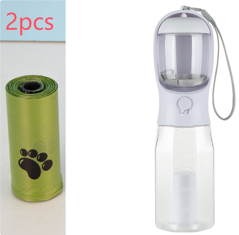 White dog water bottle with filter mesh and carrying strap, plus green poop bag roll (2 pcs)