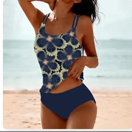 Split high-waist bikini set with navy and gold star-pattern tank and navy bottoms