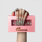 Blush short press-on nails with silver rhinestone and stud detailing, glossy finish
