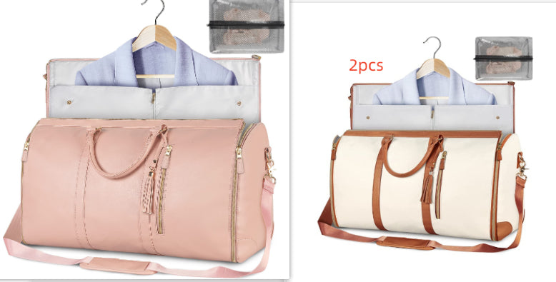 Two foldable waterproof duffle bags, pale pink and cream with brown shoulder straps