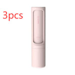 Reusable pet hair remover lint roller, self-cleaning cylindrical brush in light pink.