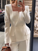 White women's blazer with square collar, flap pockets, long sleeves, two-button front