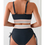 Women’s back view bikini set with dark halter top, multicolor striped waist band, tied bottoms