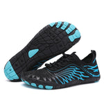 Black and aqua water shoes with textured non-slip sole and lace-up mesh upper.