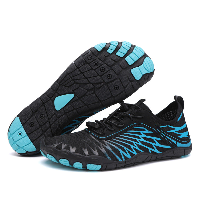 Black and aqua water shoes with textured non-slip sole and lace-up mesh upper.