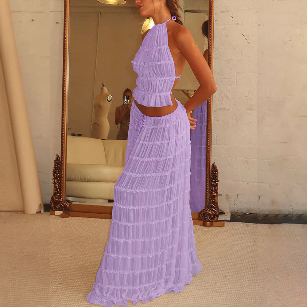 Purple halter crop top and pleated long skirt set with tiered ruffles, side view