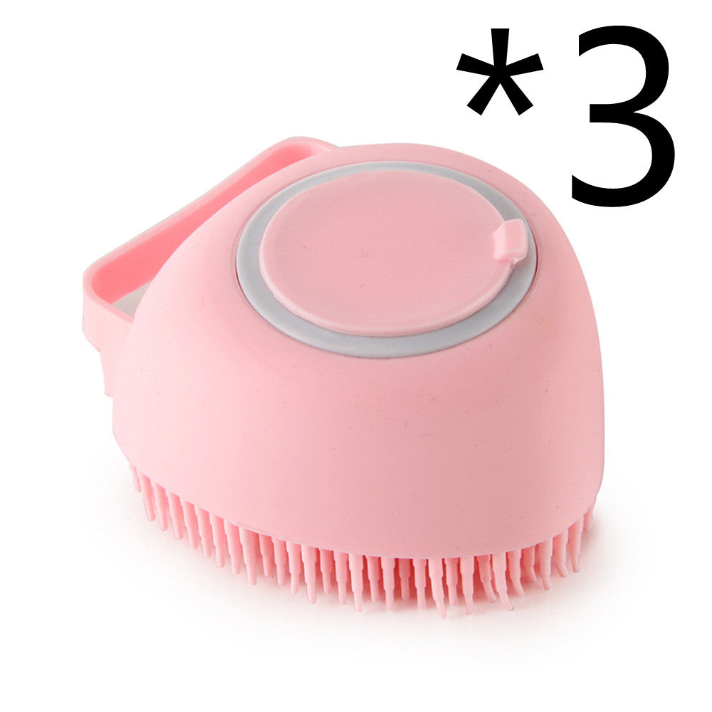 Pink silicone pet bath massage brush with round head and soft bristles