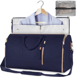 Foldable navy waterproof duffel bag with light trim, open interior, shoulder strap