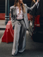 Gray blazer and wide-leg pants suit with notch lapels and front button fastening