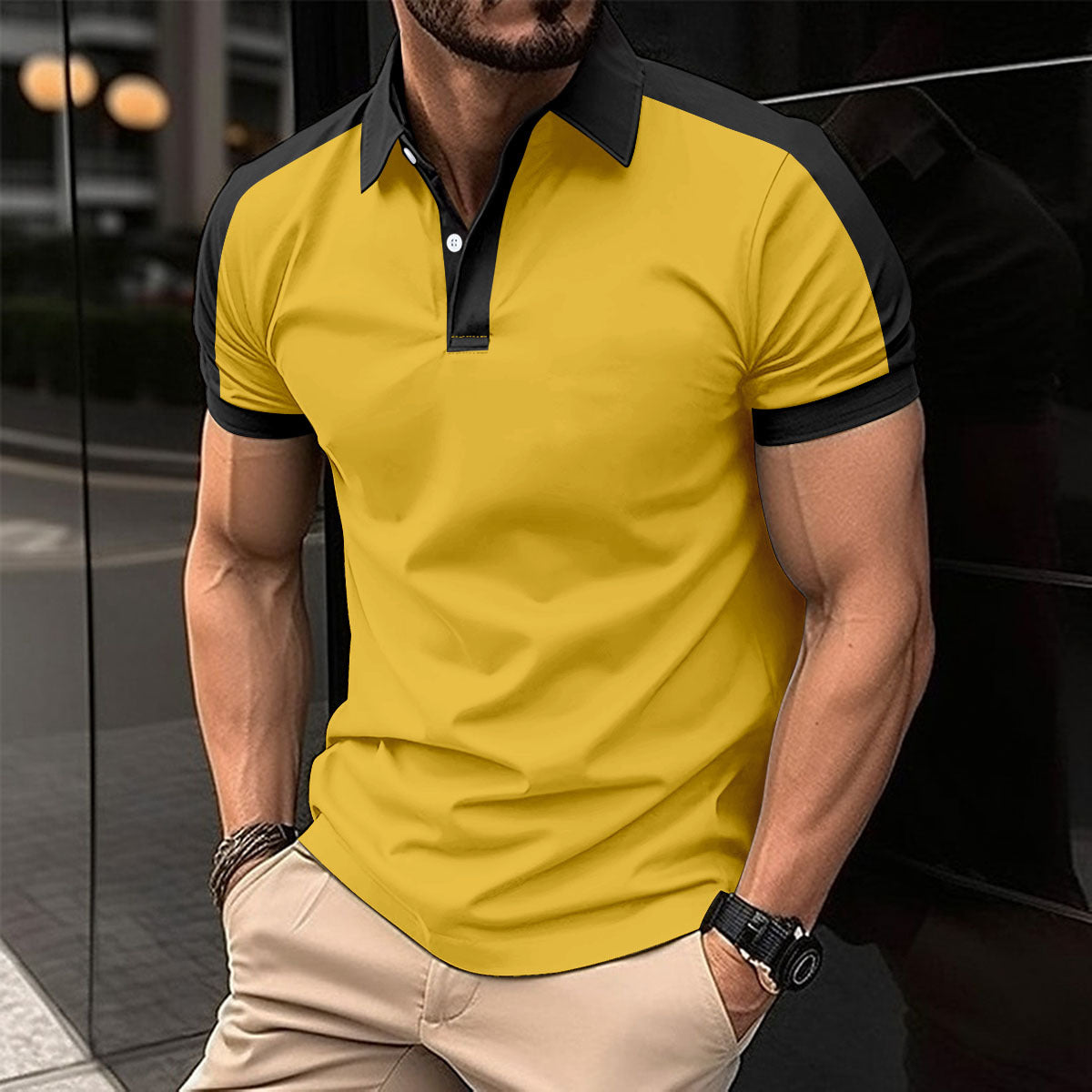 Men's yellow polo shirt with black collar trim and button placket