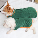 Green microfiber dog bathrobe waist wrap with orange trim, worn by small dog