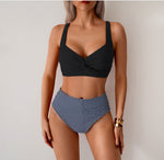 Two-piece bikini set with black twist triangle top and dark striped high-waist ruched bottoms