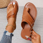 Women’s flat heel leisure slippers in tan/brown with open toe and front buckle strap