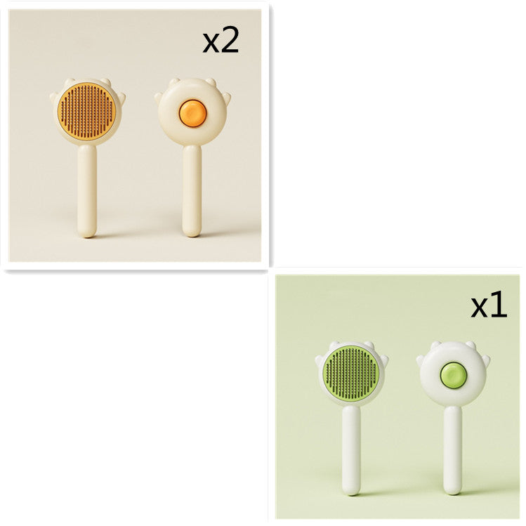 Set of two cat grooming comb brushes, cream with orange center, spiked paw heads