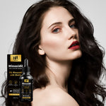 Minoxidil hair growth serum bottle and box beside a woman with dark wavy hair