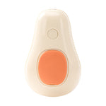 Cream electric pet grooming brush with orange control button and short bristle pins