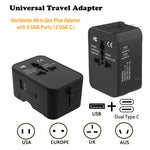 Black universal travel adapter with built-in USB ports and worldwide plug outlets