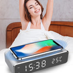 LED digital alarm clock with wireless charger, dark gray base, smartphone on top, time display