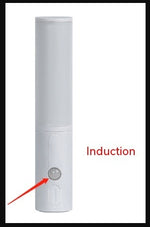 White cylindrical night light with gray motion sensor button