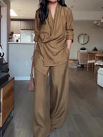 Camel satin wrap-style blouse and wide-leg pants set, long wide legs and draped hem
