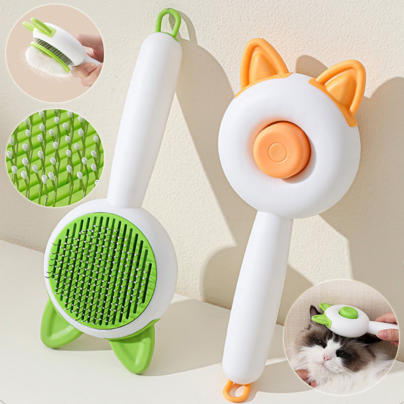Self-cleaning pet grooming brush set with green bristle pad and orange ear tips, white handle