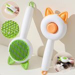 Self-cleaning pet grooming brush set with green bristle pad and orange ear tips, white handle