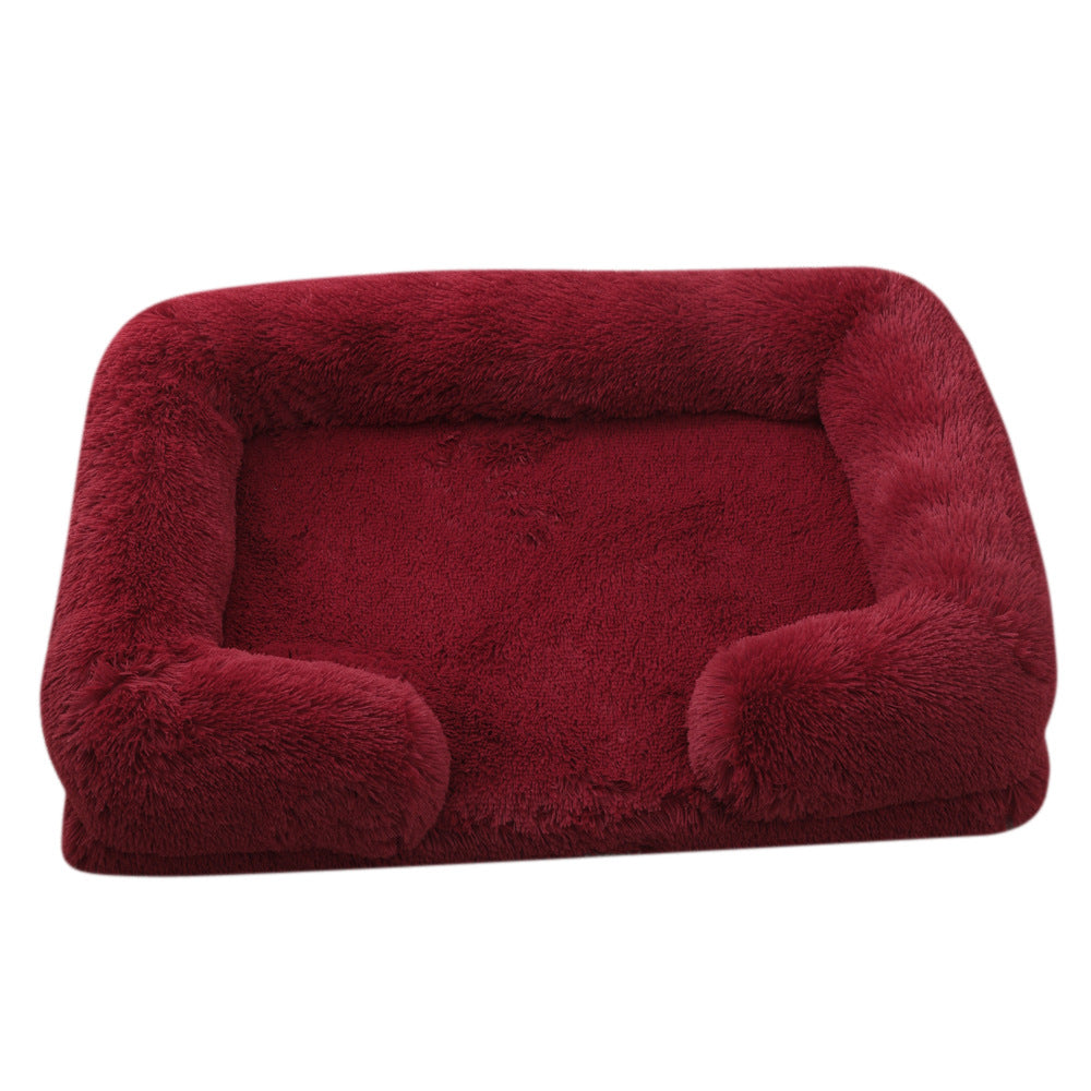 Burgundy plush round dog bed with thick cushioned sides