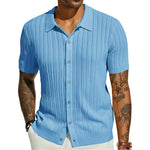 Sky blue knitted polo shirt with point collar, short sleeves, button placket