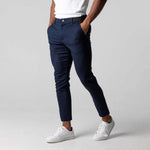 Men's slim-fit business suit pants in navy, straight leg with front crease