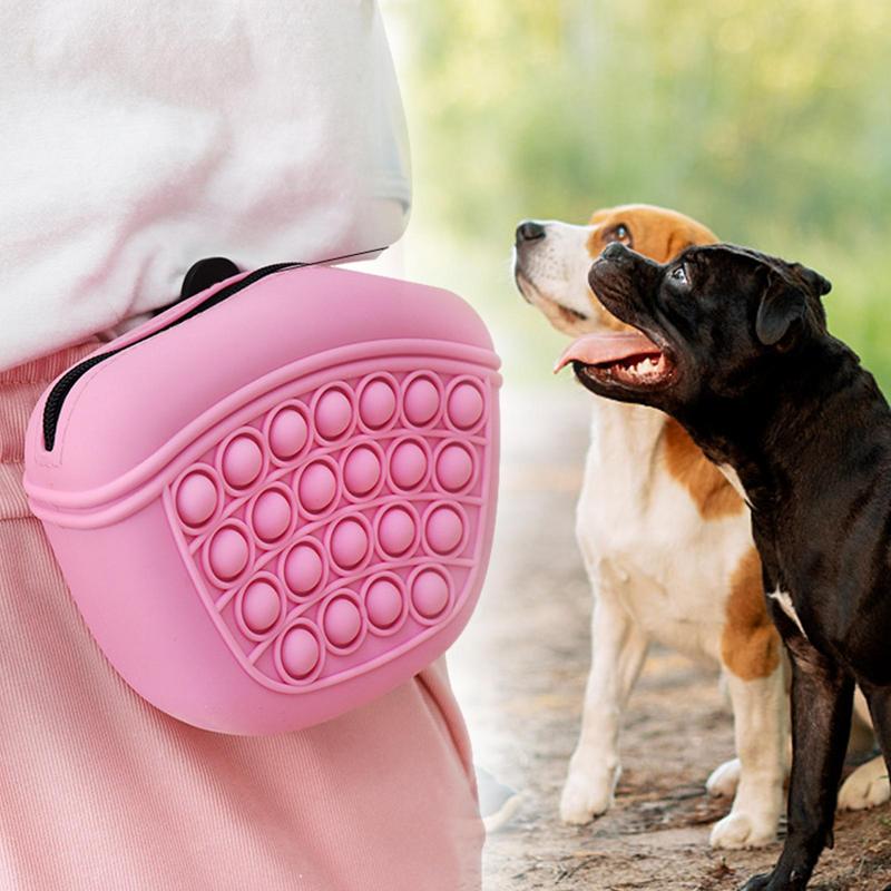 Pink silicone dog treat pouch waist pack with circular popper texture front