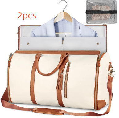 White waterproof duffel bag with brown handles, open interior organizer, shoulder strap