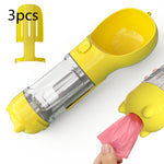 Portable pet water bottle feeder with yellow bowl and clear bottle, includes pink waste bag