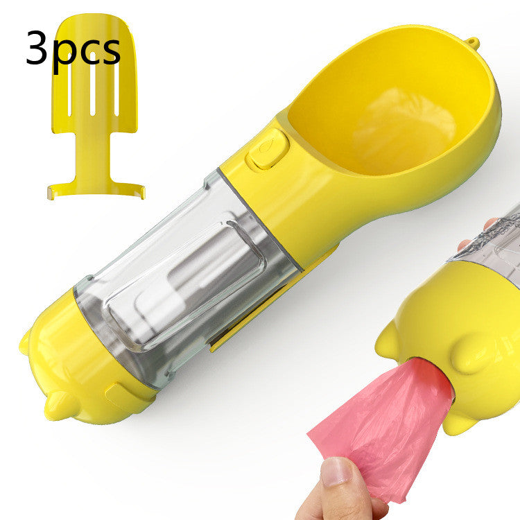 Portable pet water bottle feeder with yellow bowl and clear bottle, includes pink waste bag
