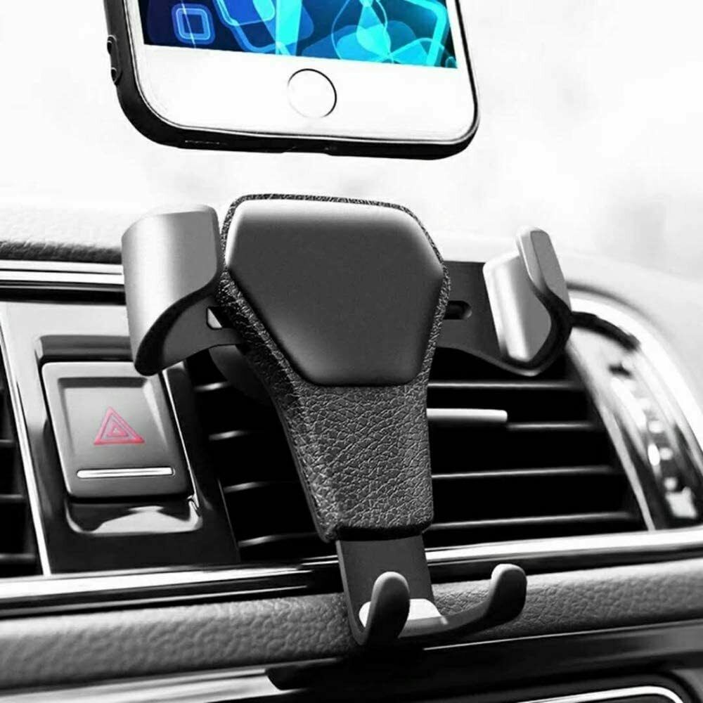Car air vent phone holder with black textured grip and clamp arms, holding a phone