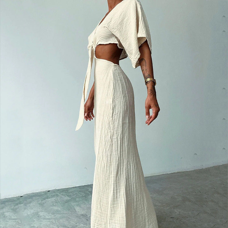 Women's milky white maxi dress with tie-front V-neck and cutout waist, draped sleeve