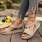 Fish-mouth wedge sandals with elastic ankle strap and jute-textured sole, light beige/khaki.