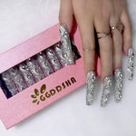 Long press-on nails on hand, silver rhinestone 3D crystal pointed design