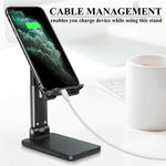Foldable desktop phone stand with black base and phone cable connected for charging