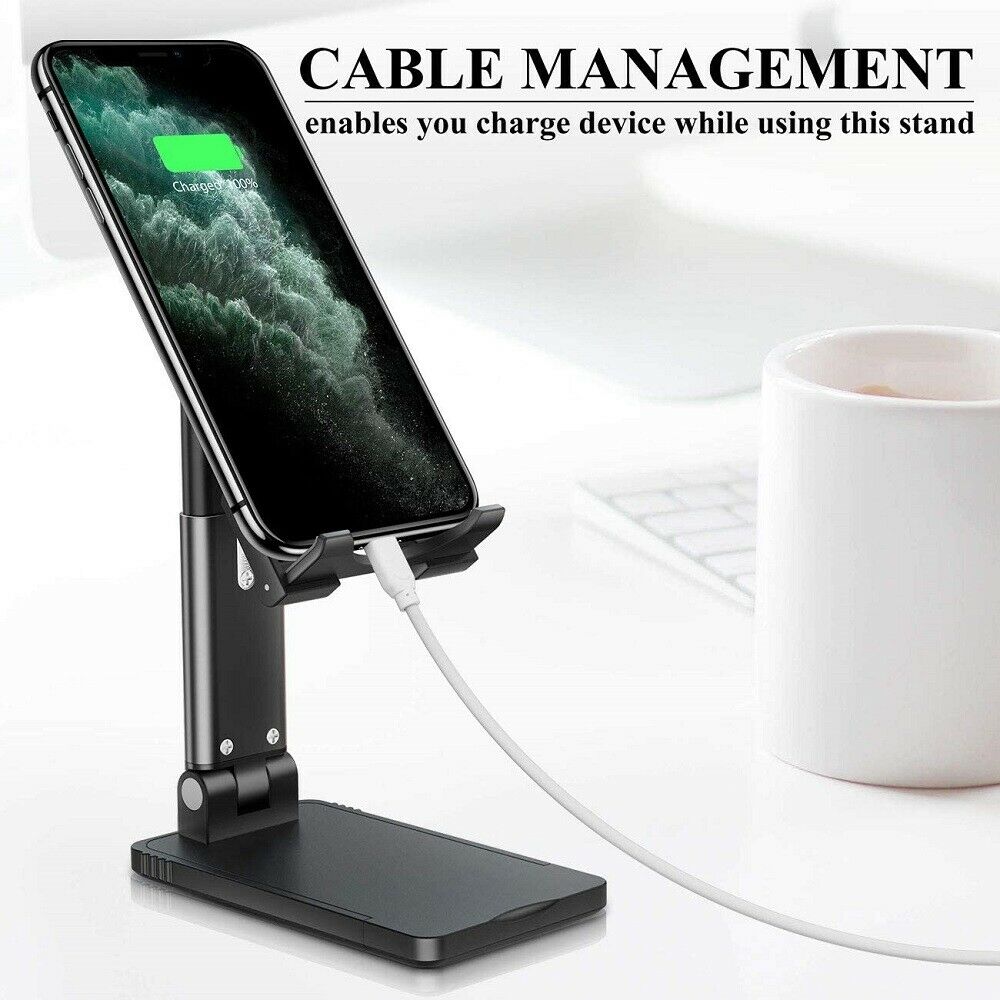 Foldable desktop phone stand with black base and phone cable connected for charging