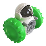 Interactive treat dispenser toy with green spiky ball, dark window top, white body