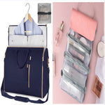Blue waterproof travel duffel with open clothing organizer and clear mesh pocket