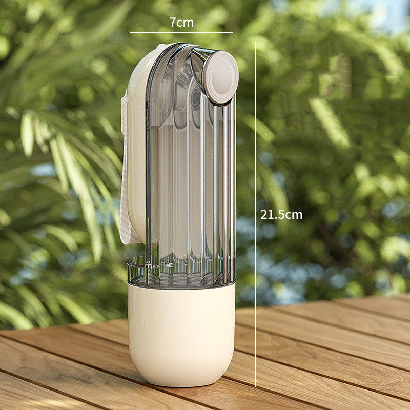 2-in-1 pet water and food bottle, clear body and white base, compact side view