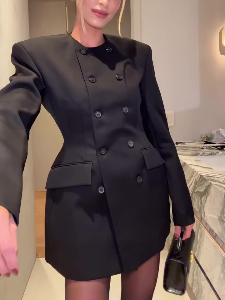 Black double-breasted mini blazer dress close-up with long sleeves and button front