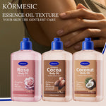 KORMESIC cocoa body oil bottle among three body oil bottles with blue caps