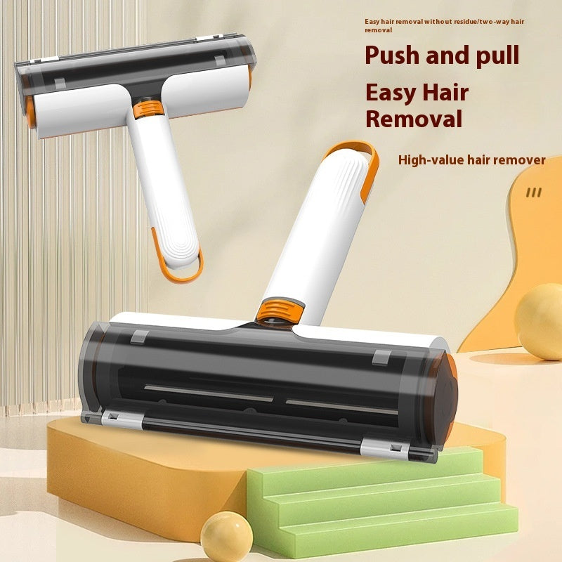 Pet hair removal roller set with white handles and orange buttons, dark lint drum